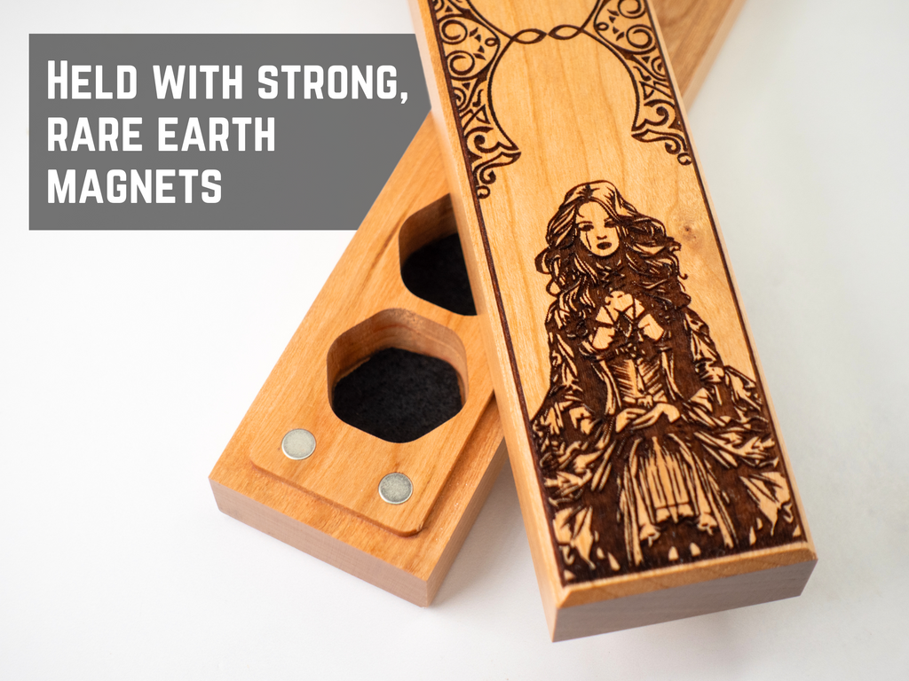 Wooden magnetic dice storage vault with engraved design on a white background