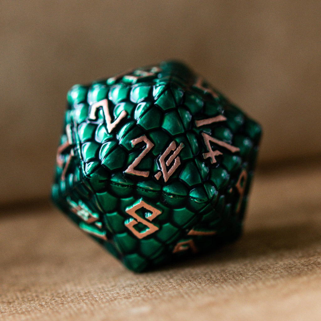 green dragon scale d20 die with bronze numbering