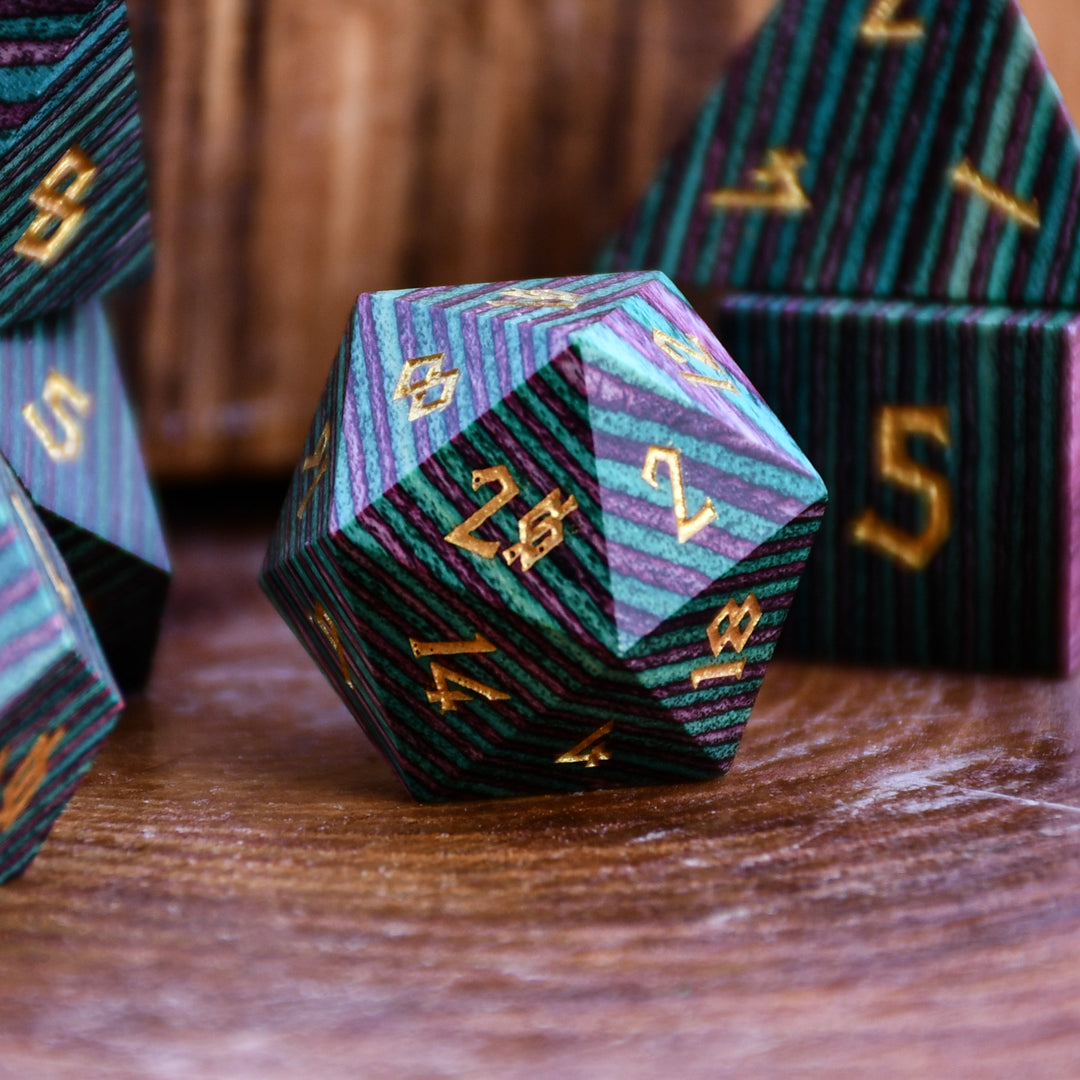 purple and green wooden dice for tabletop gaming 