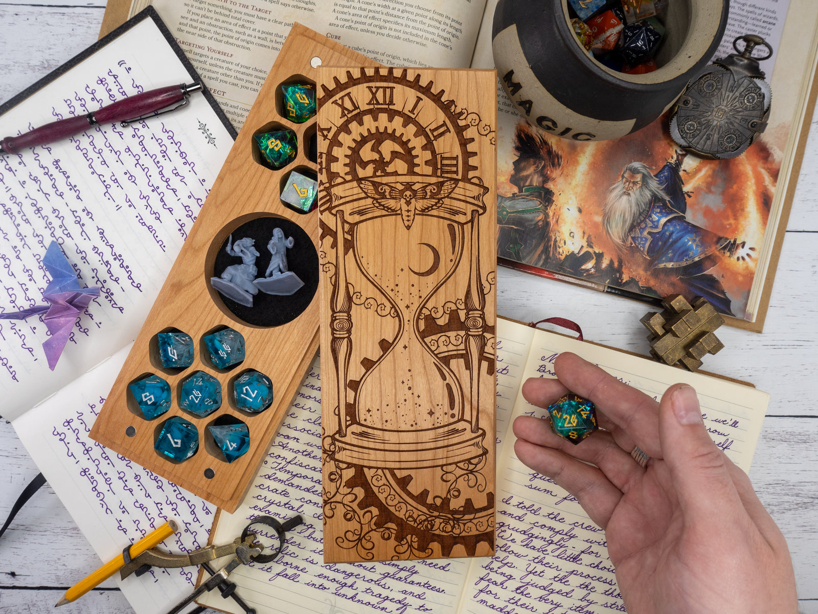 Wooden hourglass-shaped dice storage vault with dice and a small figurine on a magical-themed background.