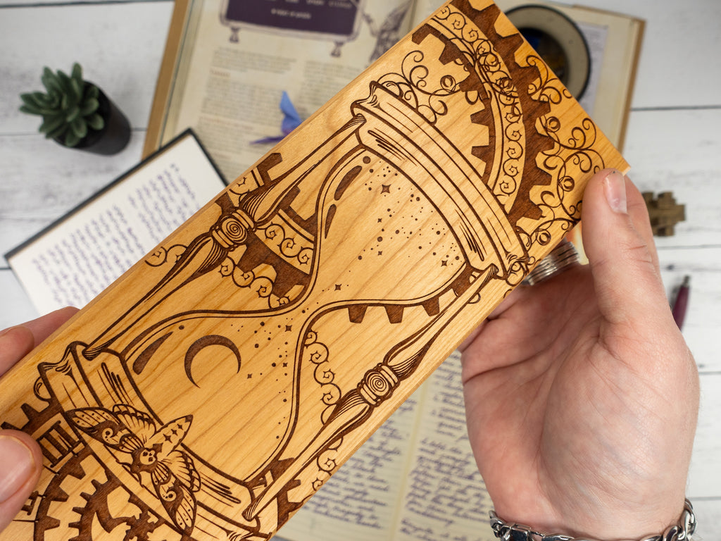 wood dice vault held in hands for tabletop gaming dice storage