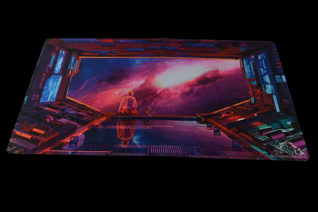 A rectangular gaming playmat featuring a space-themed design with a character looking out into space.