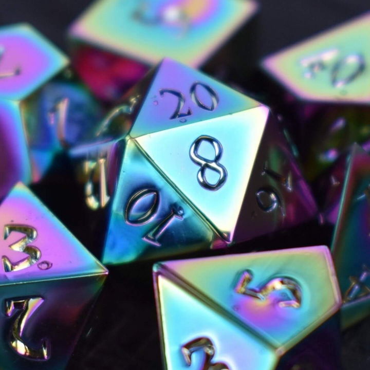 A set of iridescent metal dnd dice with engraved numbers, displaying a metallic sheen with rainbow-like reflections.