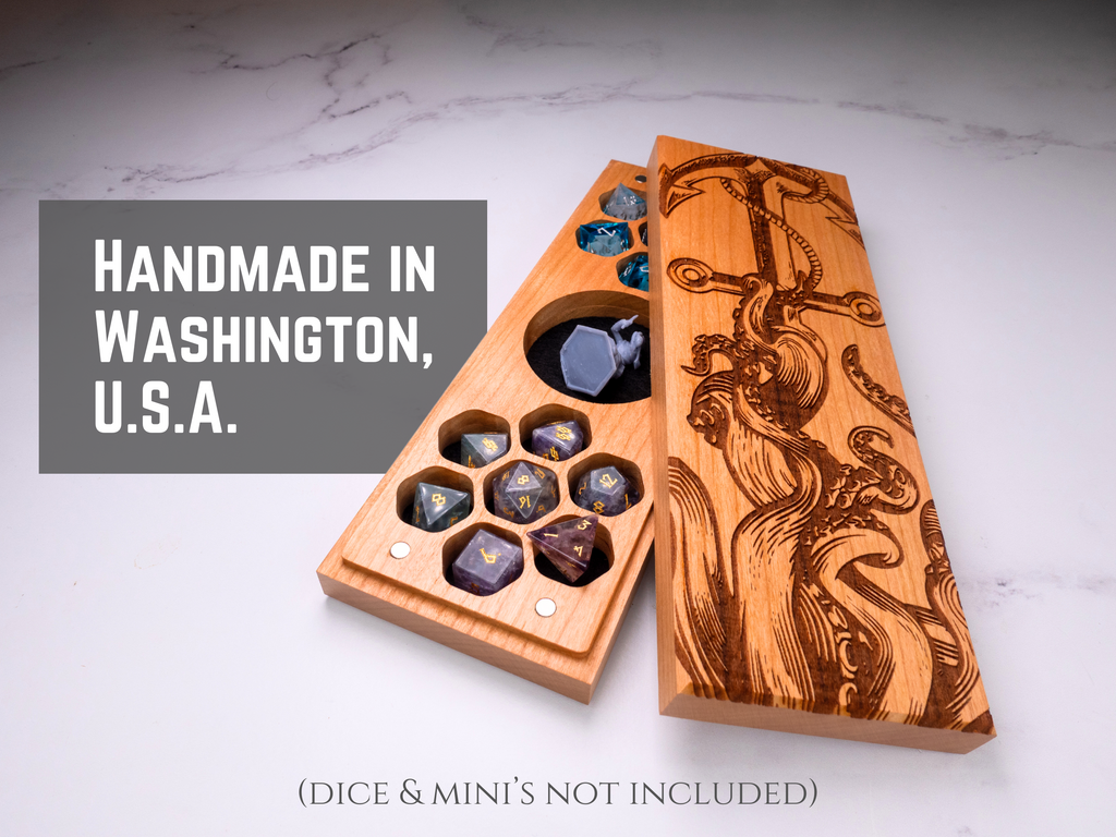 Wooden dice tray with engraved design on a marble surface, labeled 'Handmade in Washington, U.S.A.'