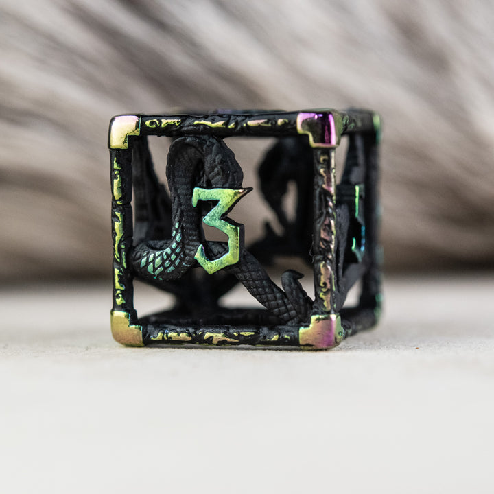 A set of black and iridescent hollow metal dice with embossed numbers, including various shapes commonly used in RPGs.