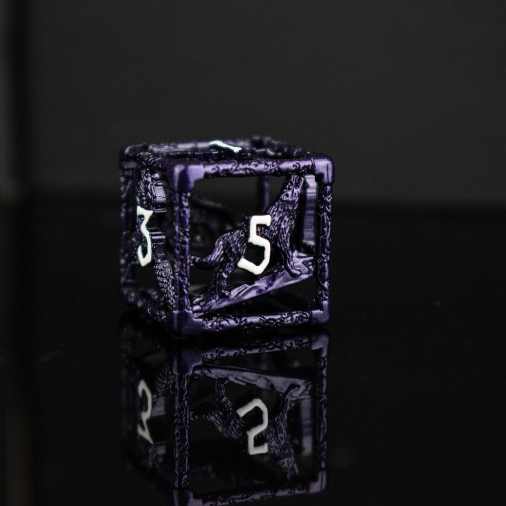 A set of purple hollow metal dice with white embossed numbers, including various shapes such as a d4, d6, d8, d10, d12, and d20, displayed on a reflective surface.