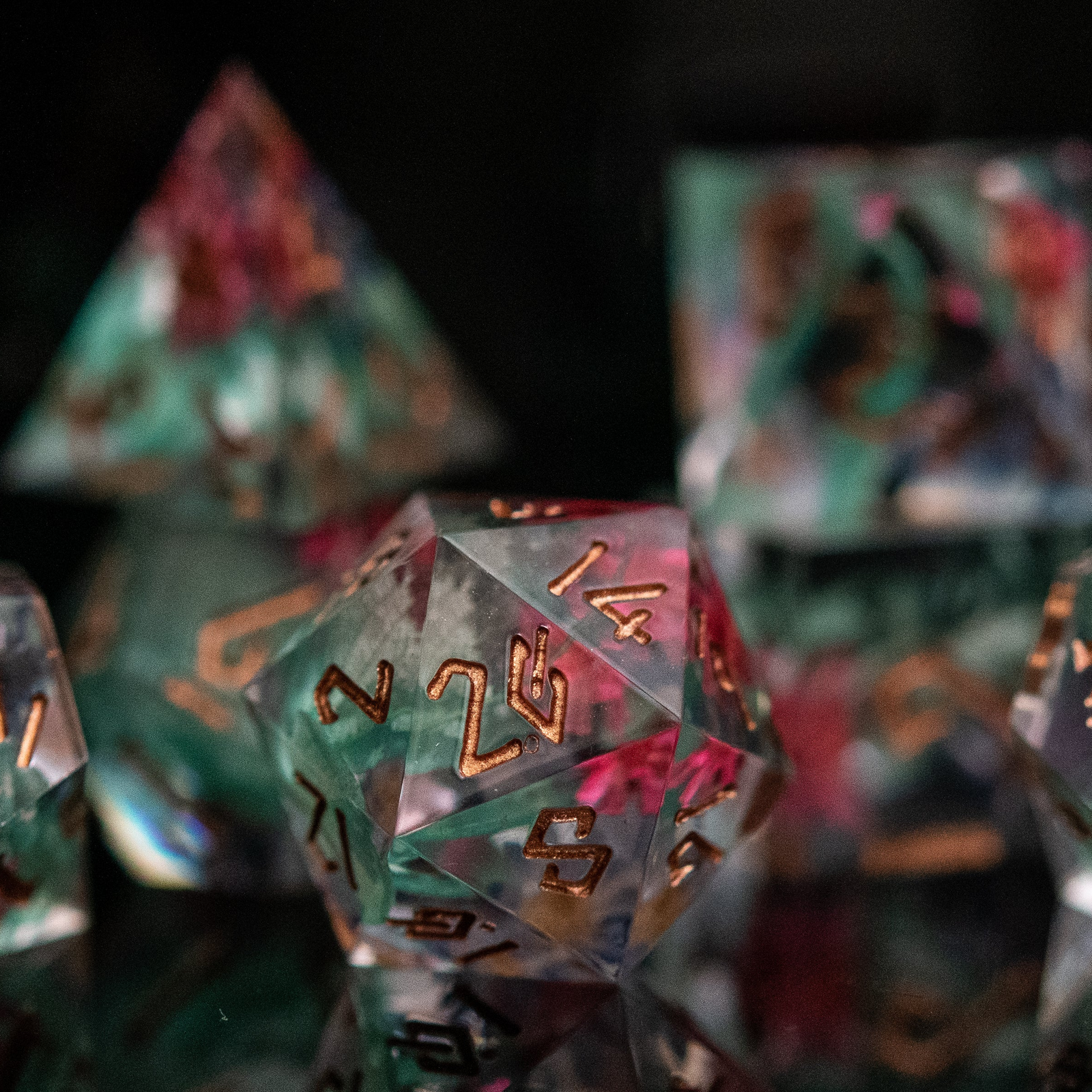 Clear dice with copper numbers on a dark background