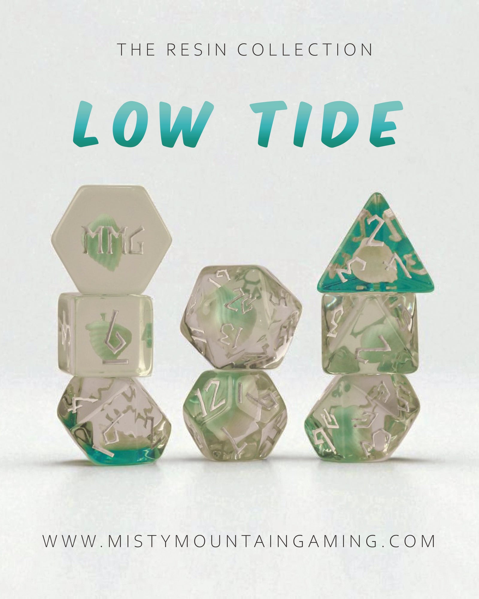 Set of green, blue and clear resin dice with 'Misty Mountain Gaming' branding on a white background.