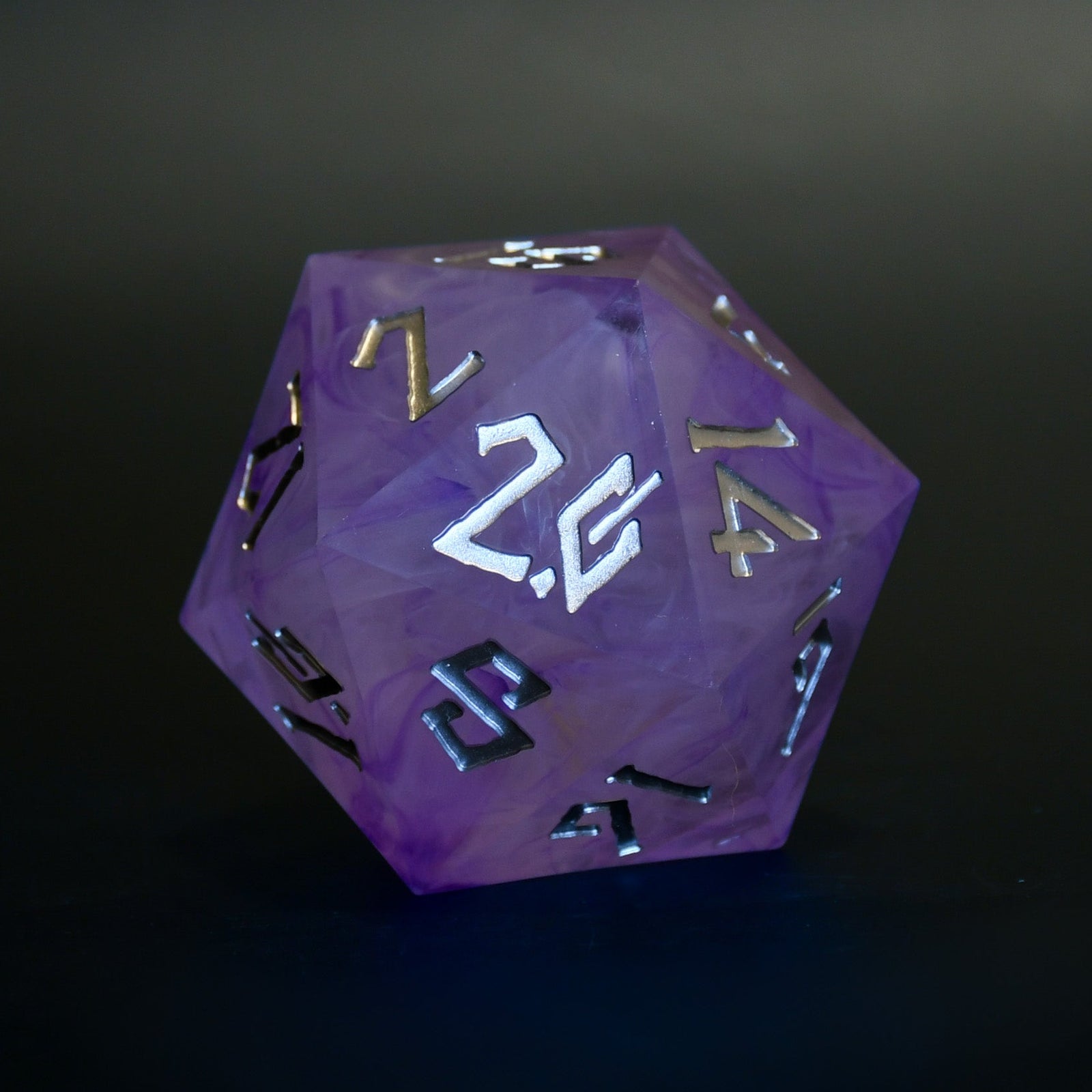A 50mm purple resin dice with engraved numbers, showing the number 20, designed for tabletop RPG games.