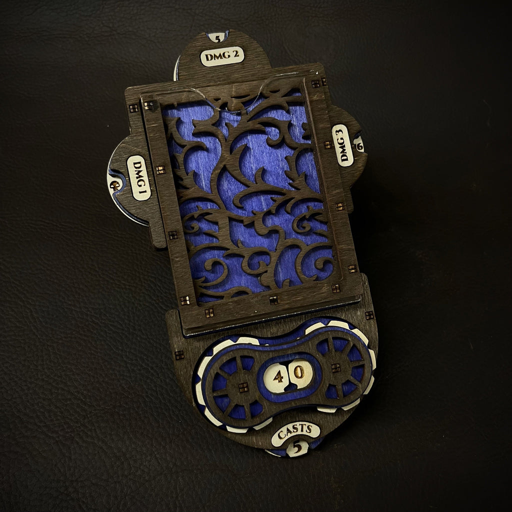 A black and blue Magic: The Gathering Command Zone game accessory with a magnetic life counter and damage dials.