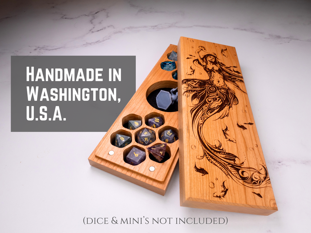 Wooden dice tray with engraved design on a marble surface, labeled 'Handmade in Washington, U.S.A.'