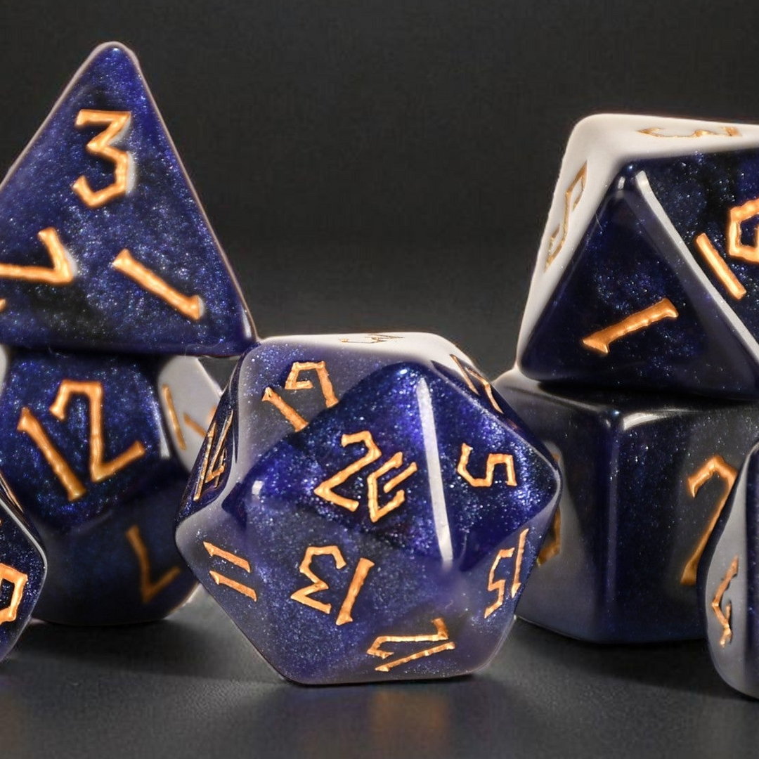 Blue polyhedral dice with gold numbers on a black background