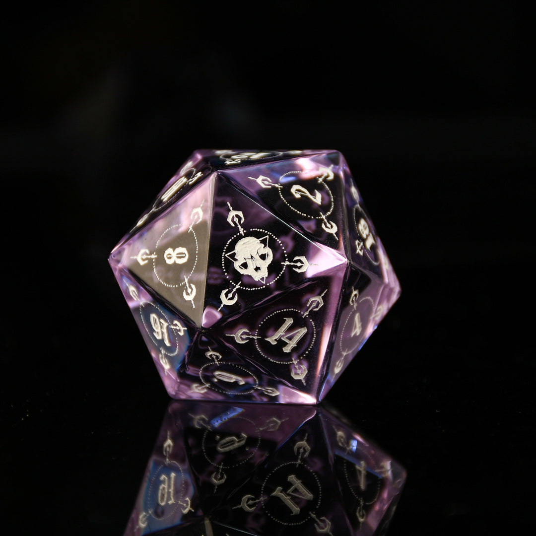 Purple polyhedral dice with white numbering on a black background