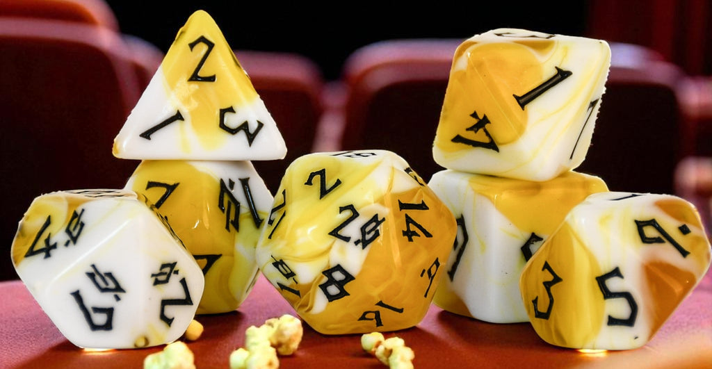 Set of yellow and white polyhedral dice acrylic dice with black numbers inspired by popcorn