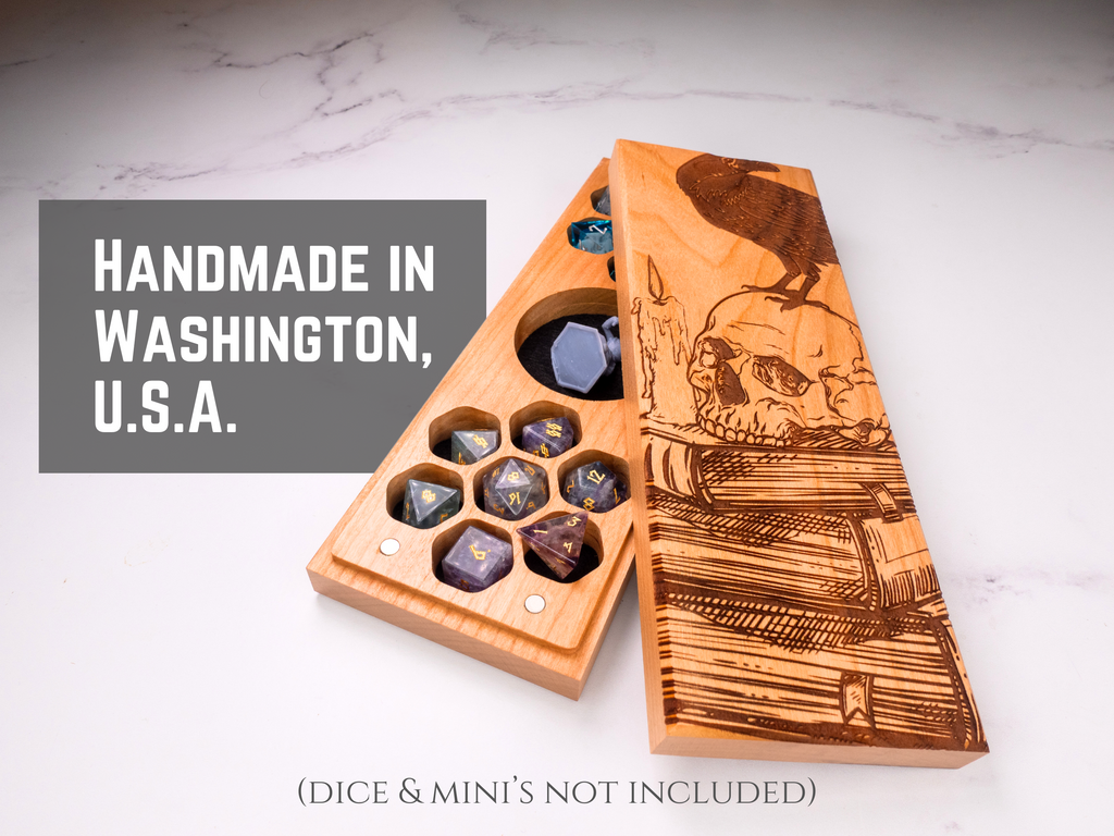 Wooden dice tray with engraved design on a marble surface, labeled 'Handmade in Washington, U.S.A.'
