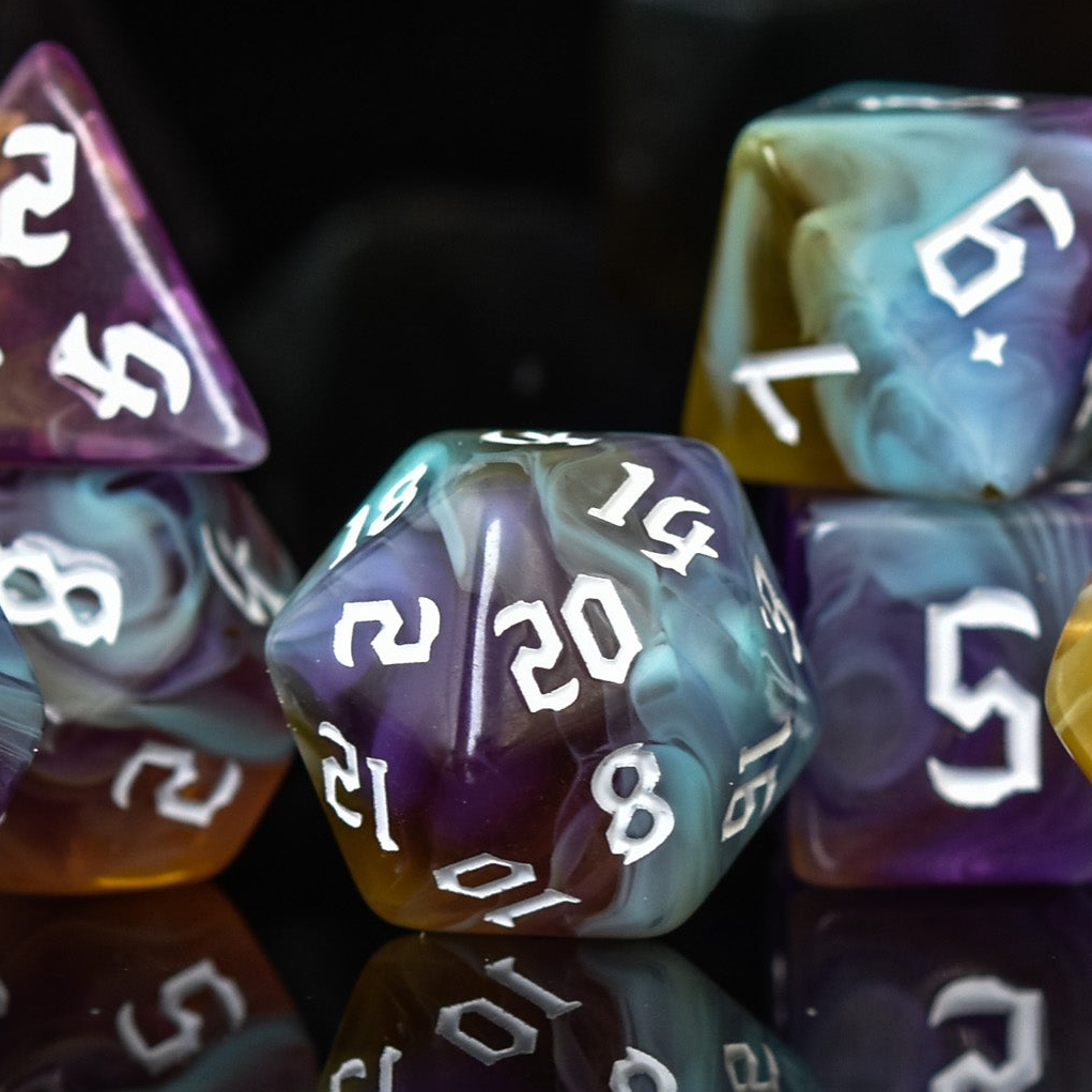 A set of multicolored acrylic dnd dice with engraved numbers, reflecting on a shiny surface.