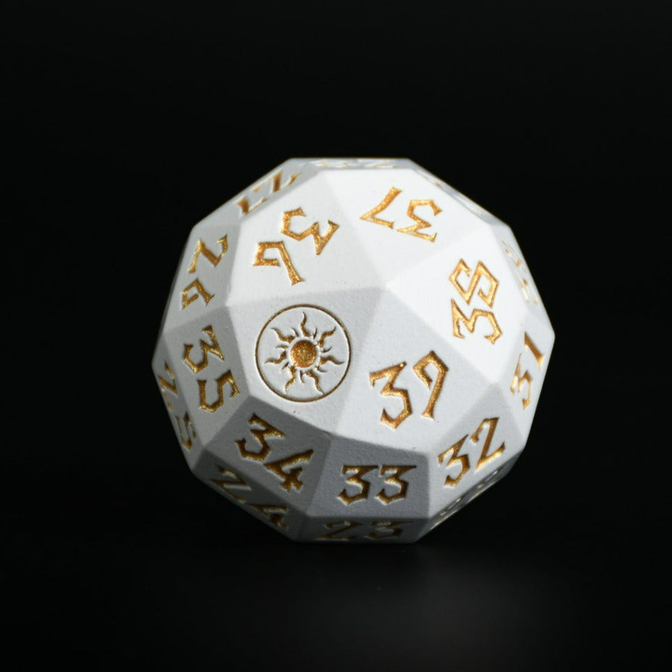 Plains Mana Spindown Metal D40 die with gold numbering on a black background