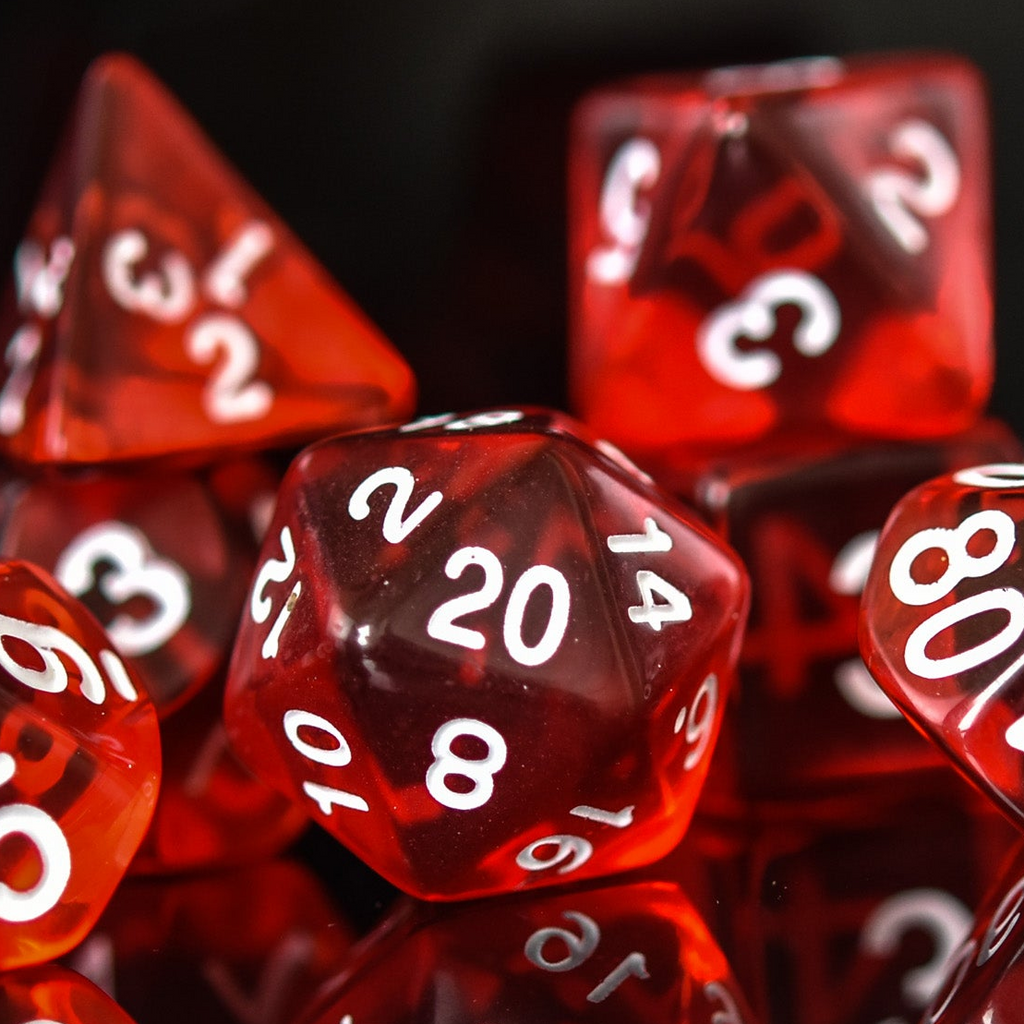 a set of red acrylic dnd dice with white numbers
