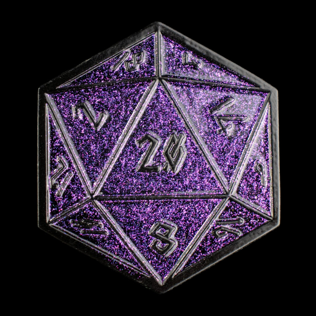 One purple glitter d20 dice pin on a dark background