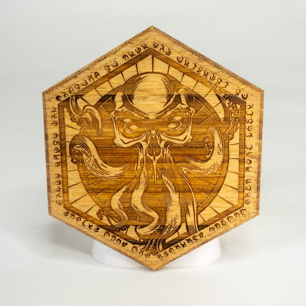 A wooden DM screen decoration with a fantasy creature and text design, used for role-playing games.