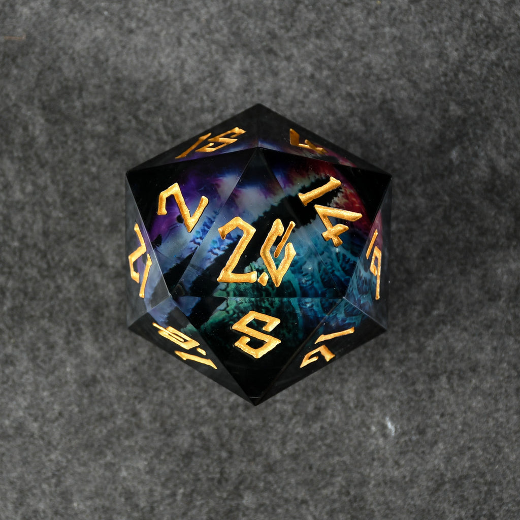 A large, multicolored dice with engraved numbers and a rainbow dragon design, featuring a floating eye illustration in the center.