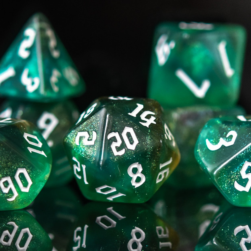 Green polyhedral dice with white numbers on a reflective surface