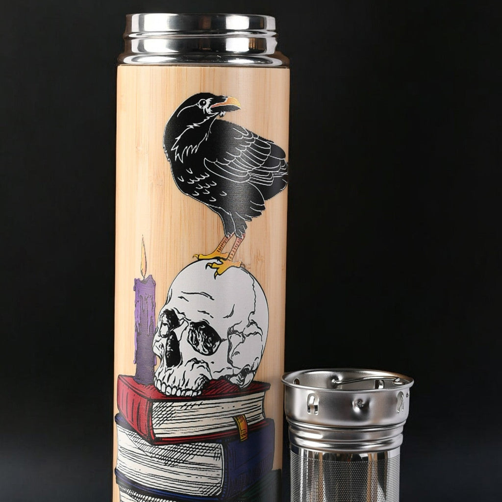 Tumbler with decorative design and metal lid and mesh tea infuser 