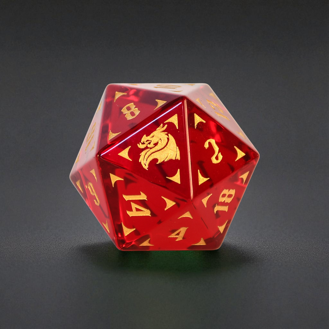 red glass d20 dnd die with gold numbering and dragon detail ttrpg