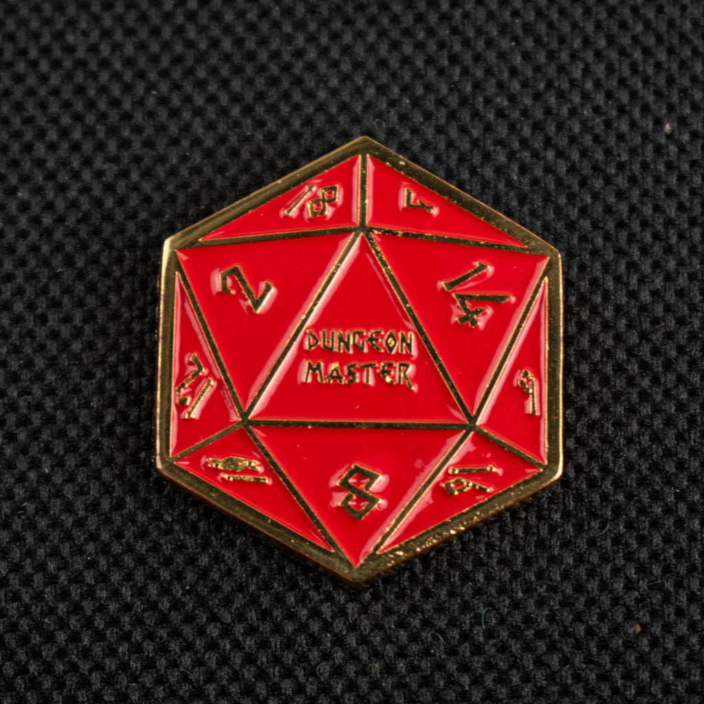 Red polyhedral d20 with gold border on a black background