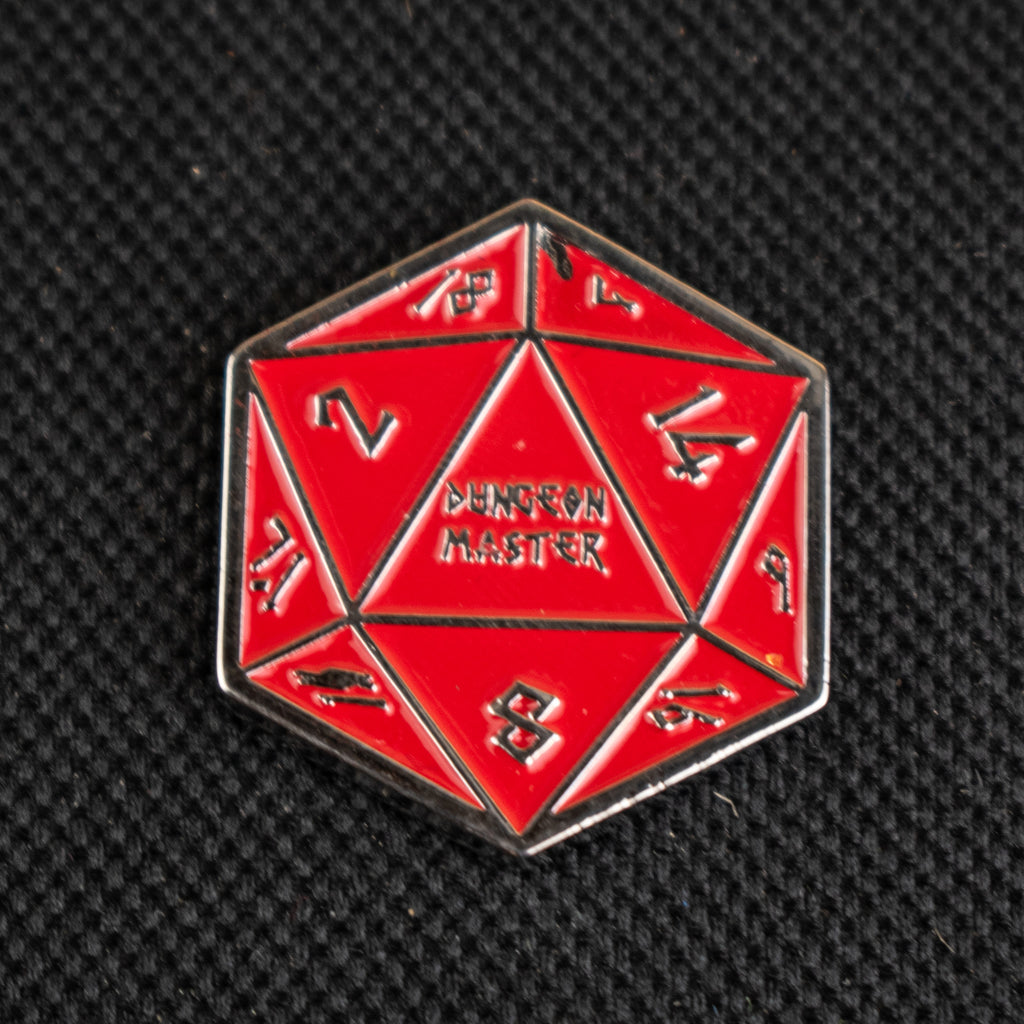 Red polyhedral d20 pin with gold numbers on a black background