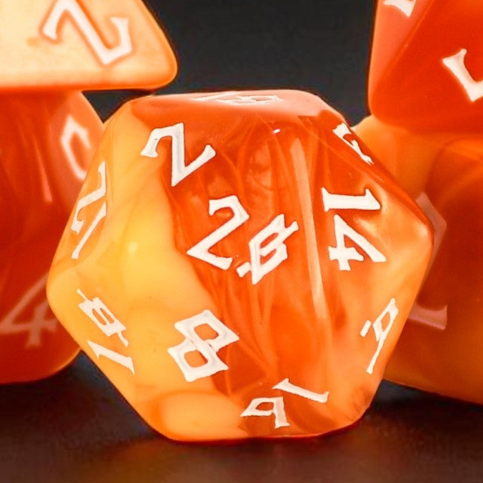 Orange dice with white numbers on a dark background