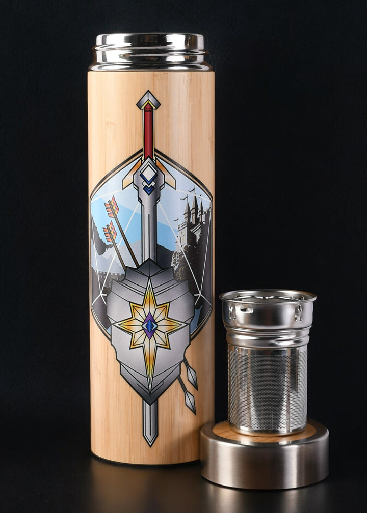 travel mug with decorative emblem and metal tea diffuser