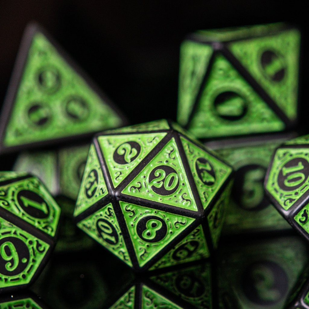 Green polyhedral dice set with black numbering on a dark background