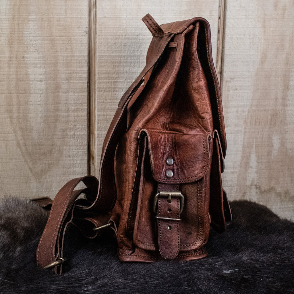 Brown leather mini tabletop gaming leather backpack