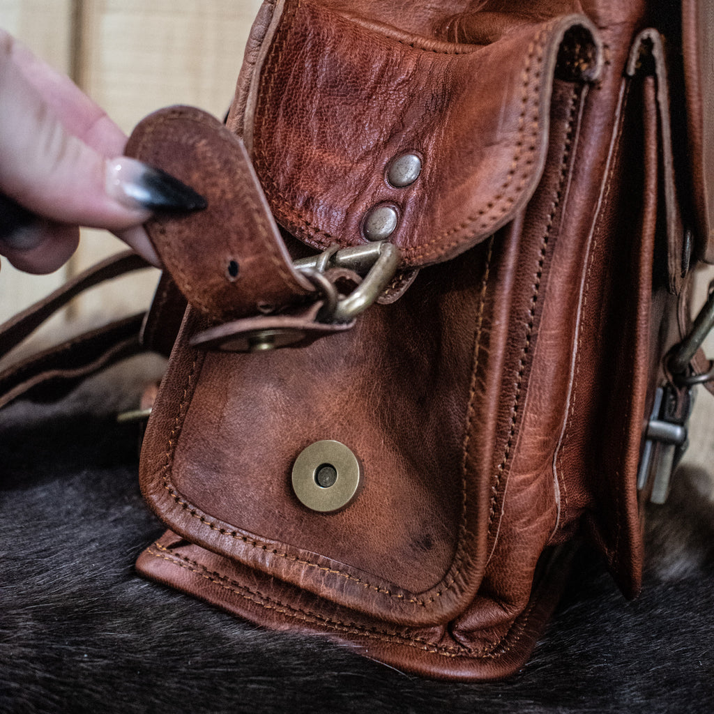Brown leather mini tabletop gaming leather backpack