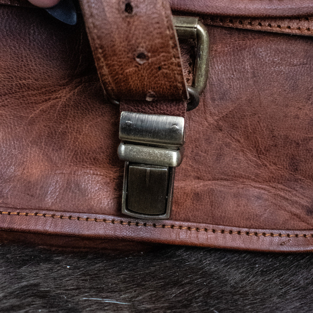 Brown leather mini tabletop gaming leather backpack