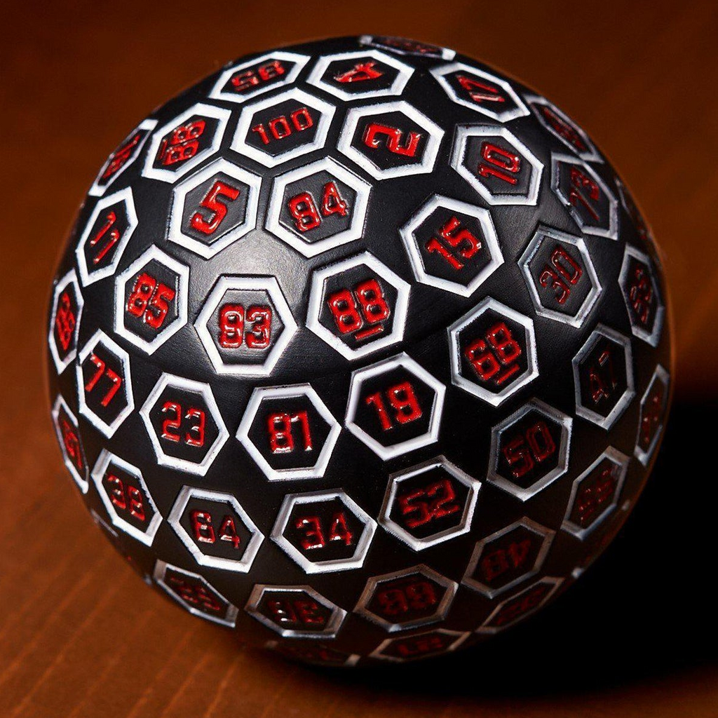 Hexagonal die with numbers on a wooden surface