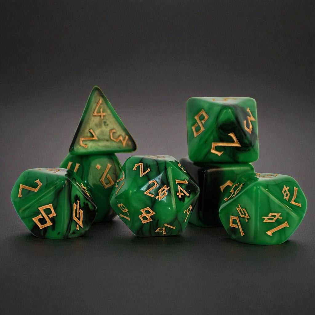 a set of green acrylic dice with black swirls and gold numbering for gaming