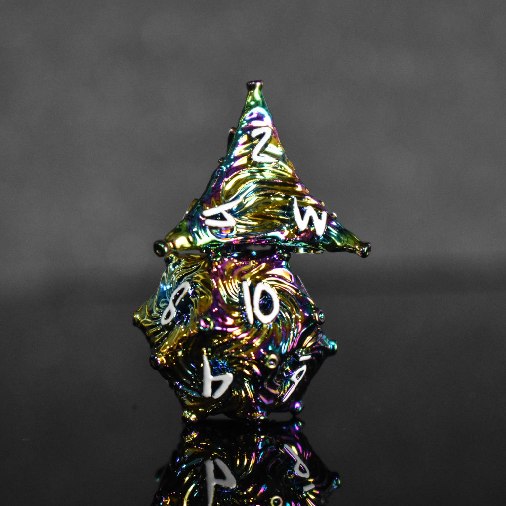 Iridescent metal dice with vortex swirls and a white font