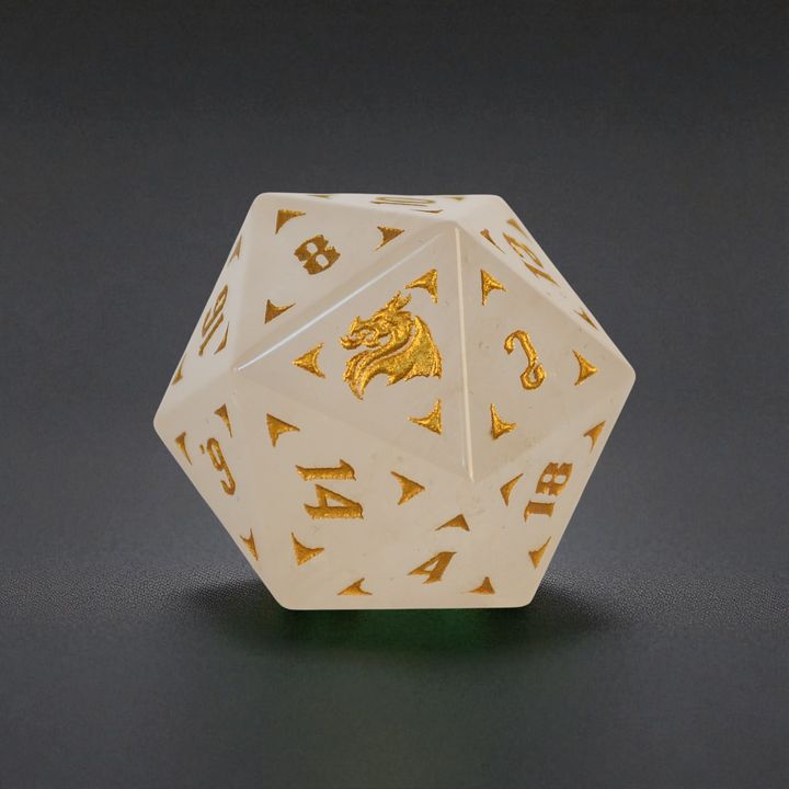 White polyhedral dice with gold numbers and symbols on a dark gray background