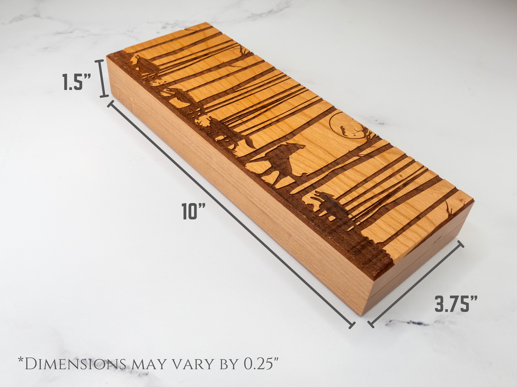 Wooden dice vault with laser-cut design on a white background