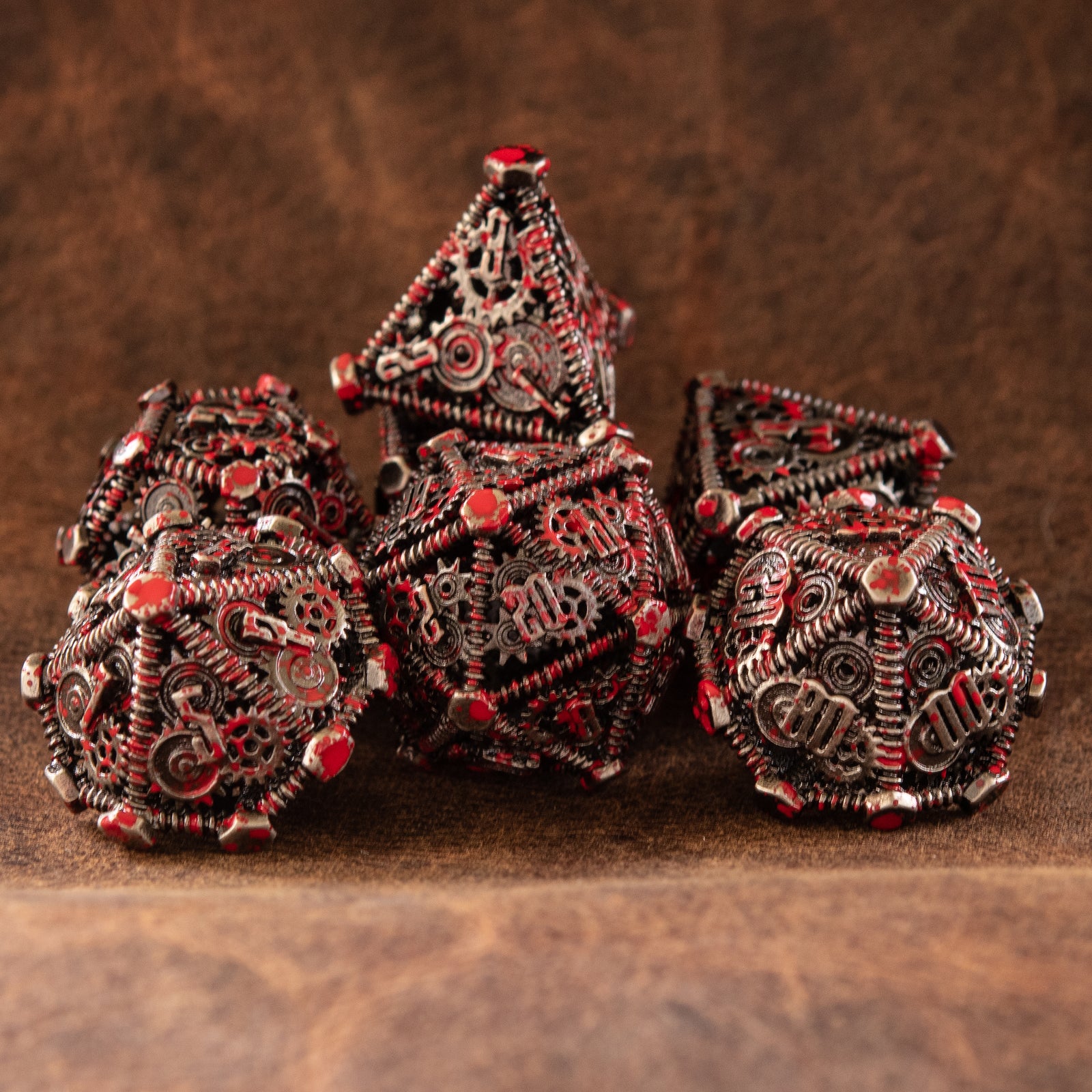 bloody splattered steampunk inspired metal hollow dice for tabletop gaming