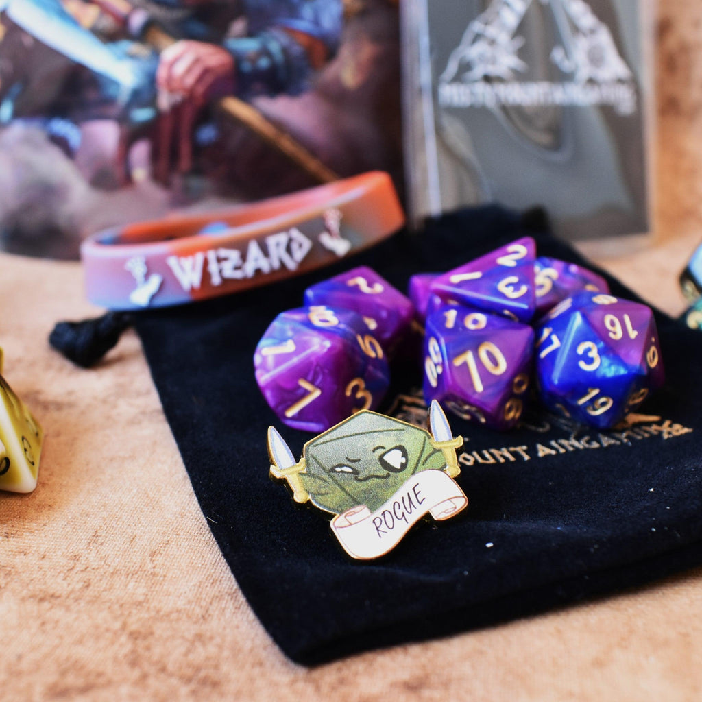 A set of acrylic dice along with examples of other items in our mystery bag
