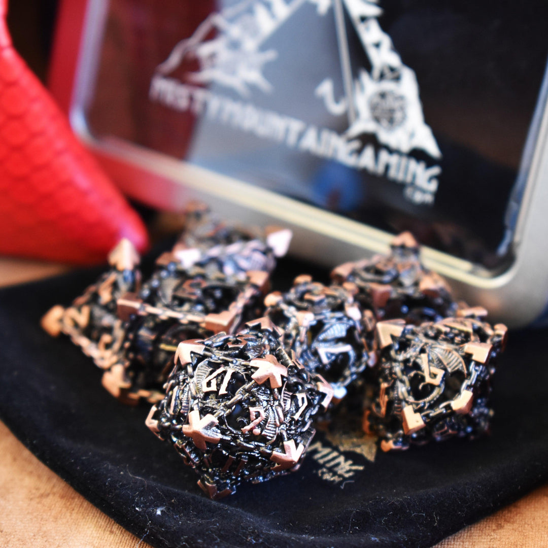 A hollow metal dice set