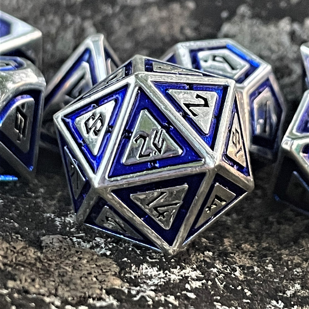 silver metal d20 dnd die with blue border on each face and black numbering for wargaming tabletop gaming and board games
