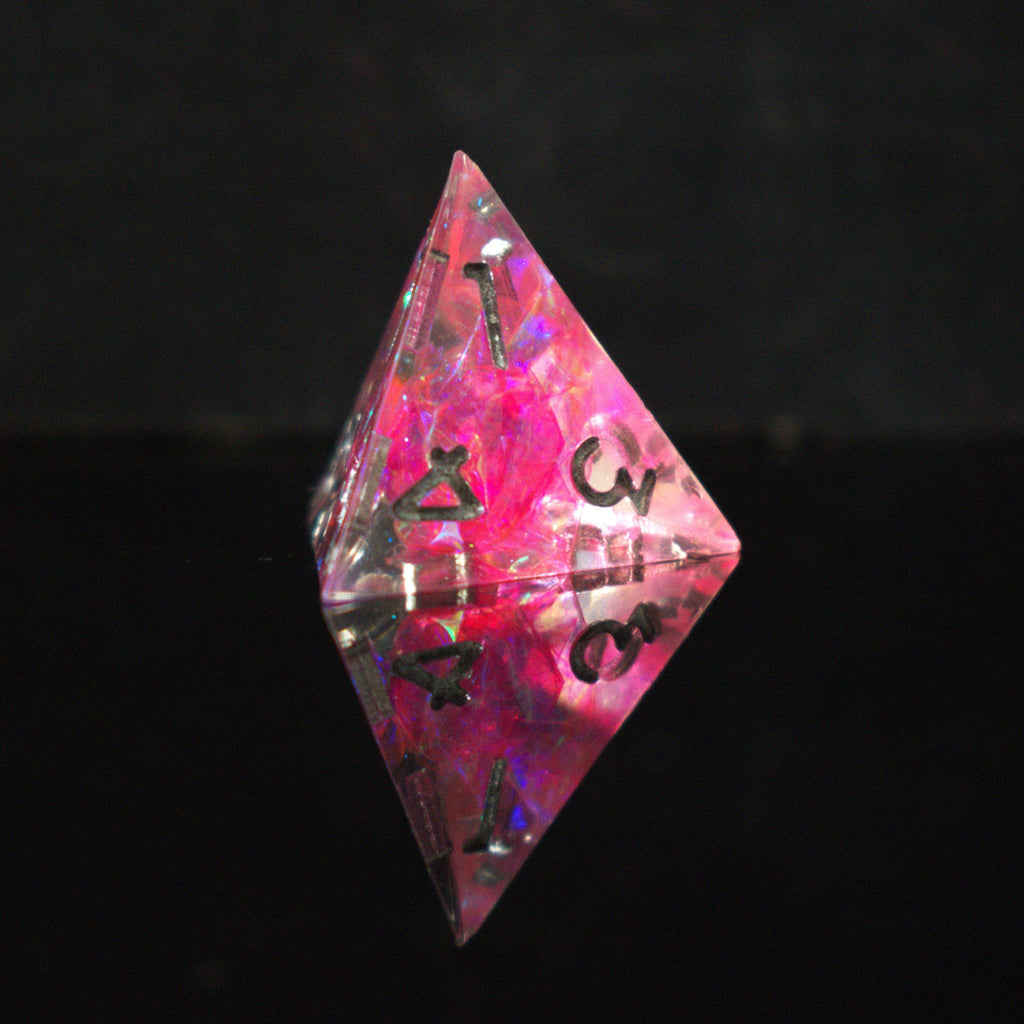 A set of sharp-edged, pink resin dnd dice with silver engraved numbers, reflecting a metallic sheen inside of each die