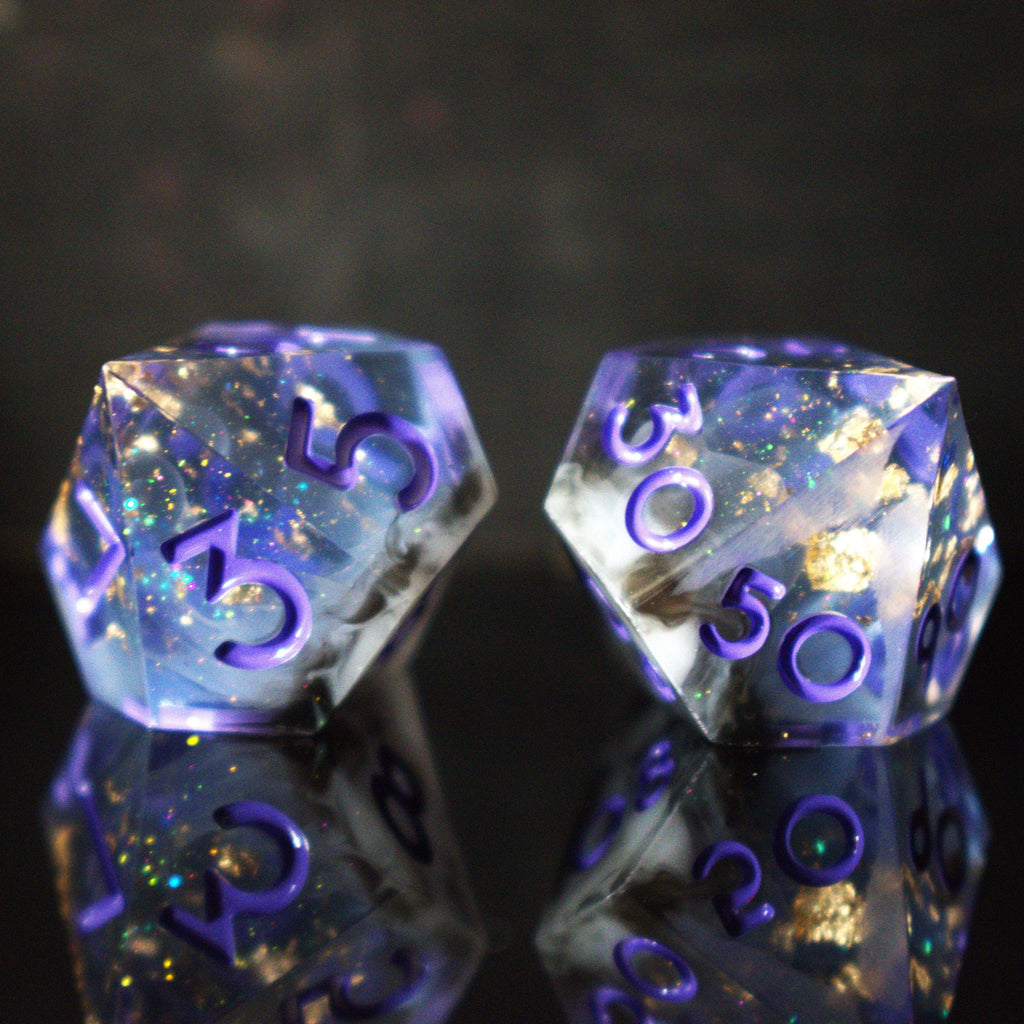 A clear, glittery sharp edge resin dnd dice set with cloudy white and black running through them and purple numbering for tabletop gaming