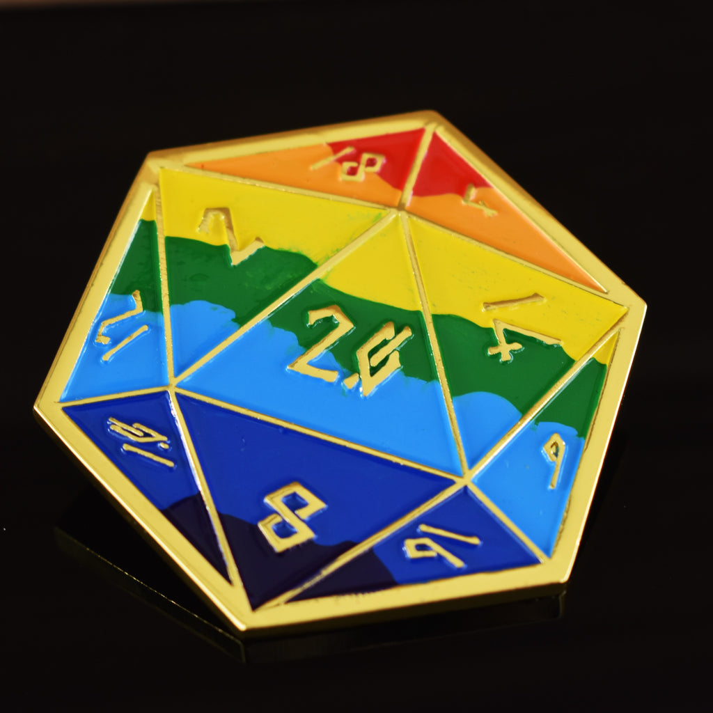 A colorful D20-shaped pin with gold trim, featuring numbers 