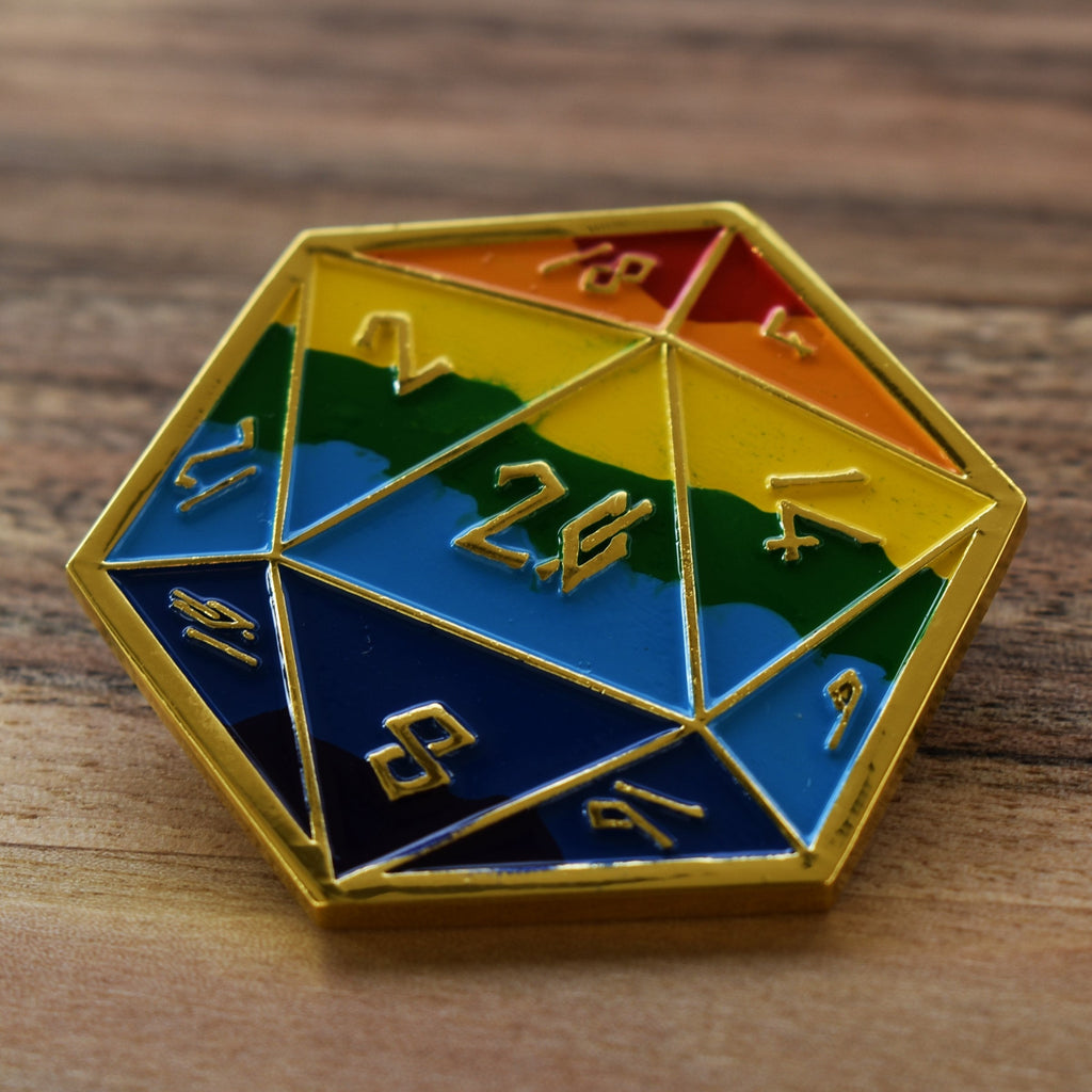 A colorful D20-shaped pin with gold trim, featuring numbers 