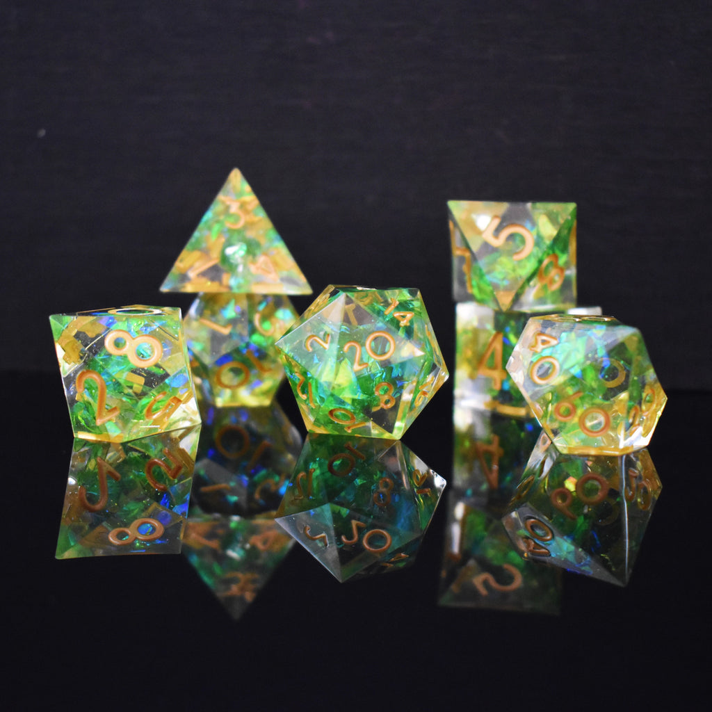 A dice set with a bright green within a clear sharp resin with gold numbers